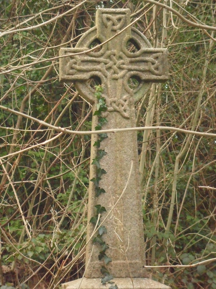 a Cross in a Cemetry