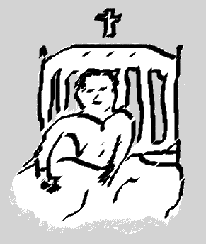 a boy in a bed below a crucifix